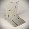 DIY Portable Jigsaw Swastik Slot Stand for Mobile, E-Book, Cards (Metallic Silver)