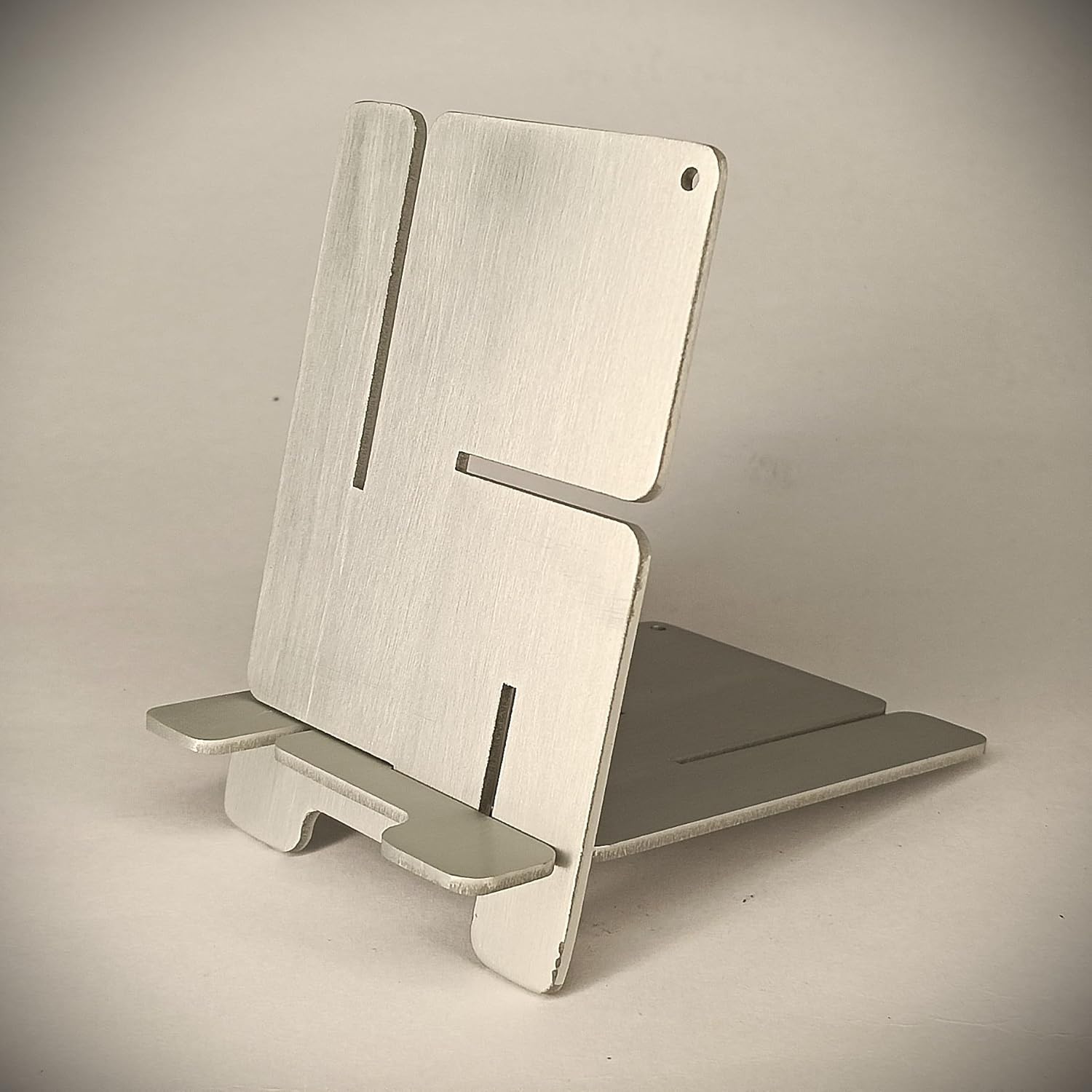 DIY Portable Jigsaw Swastik Slot Stand for Mobile, E-Book, Cards (Metallic Silver)